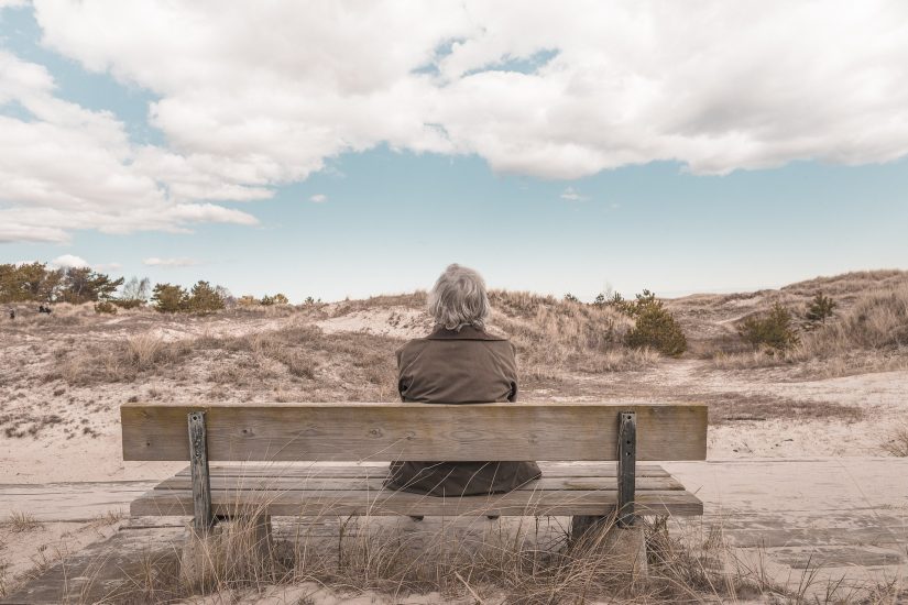 person sitting on bench