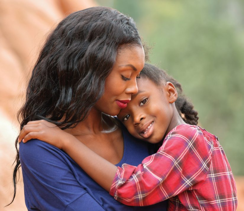 mother and daughter embracing