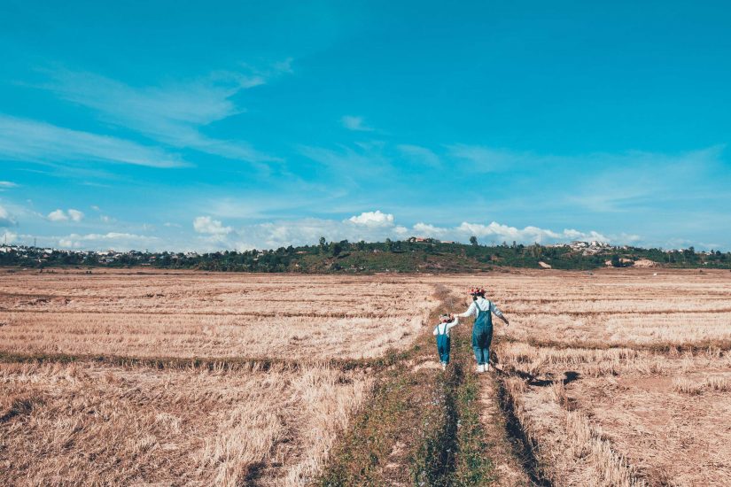 mom with child in country