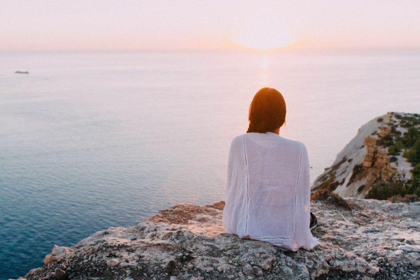 woman looking out to sea