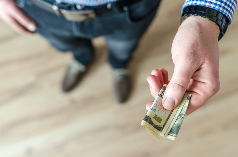 person holding money