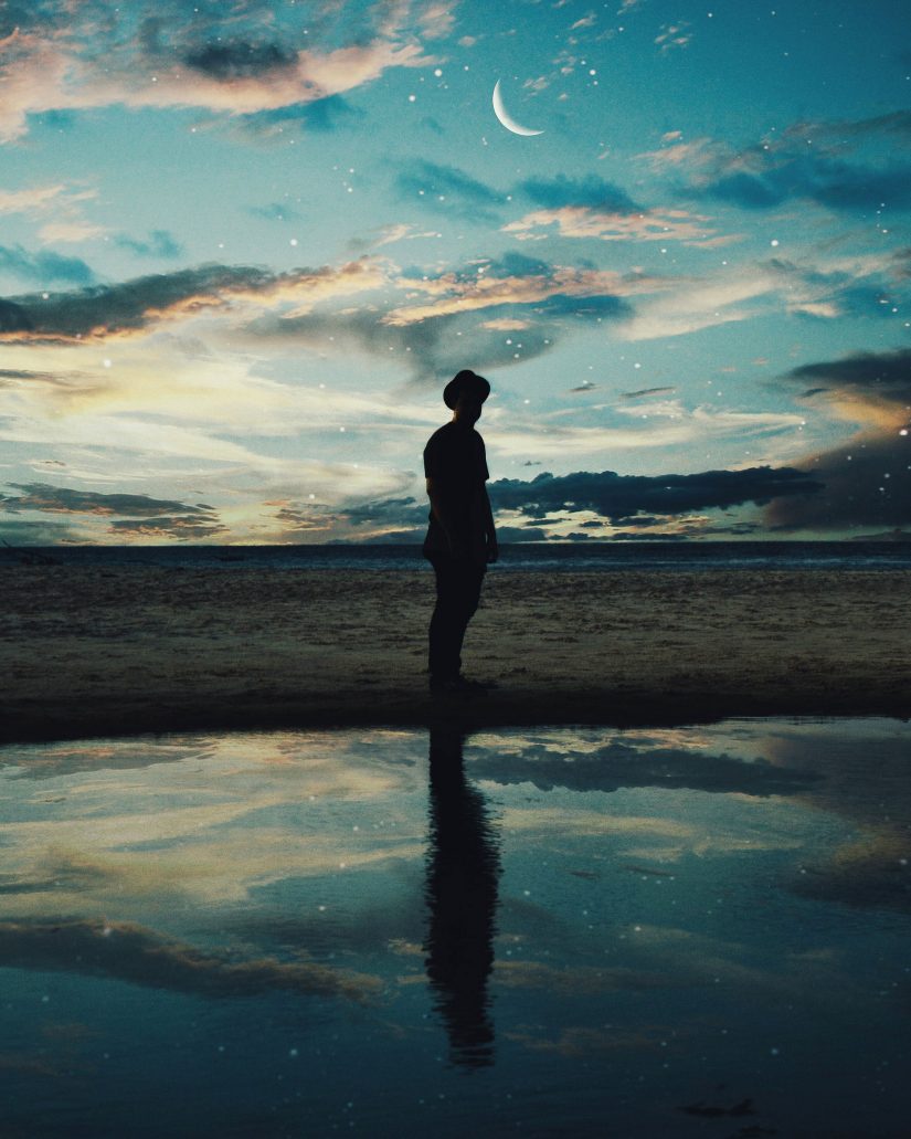 reflection of man in water